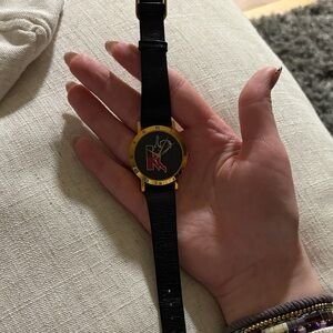 Black and Gold Watch with Unique Dial